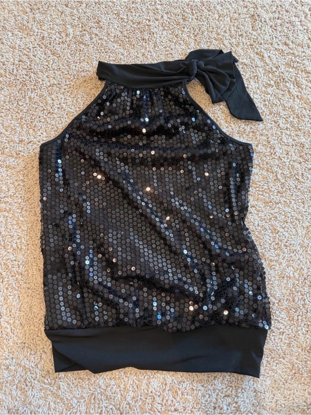 Sleeveless halter top in glossy black sequins